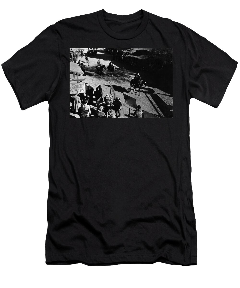Johnny Cash Riding Horse Filming Promo Main Street Old Tucson Az A Gunfight Kirk Douglas A Boy Named Sue San Quentin Prison Concert Recorded By Granada Television Great Britain T-Shirt featuring the photograph Johnny Cash riding horse filming promo main street Old Tucson Arizona 1971 by David Lee Guss