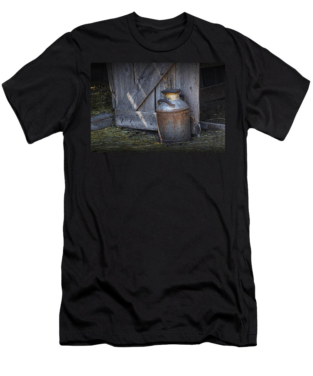 Creamery Can T-Shirt featuring the photograph Old Prairie Homestead Vintage Creamery Can by the barn door by Randall Nyhof