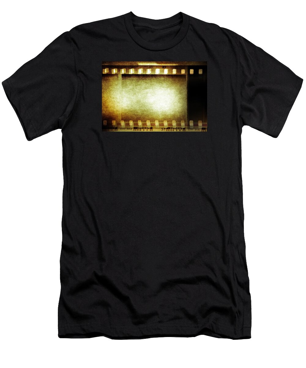 Film T-Shirt featuring the photograph Filmstrip by Les Cunliffe