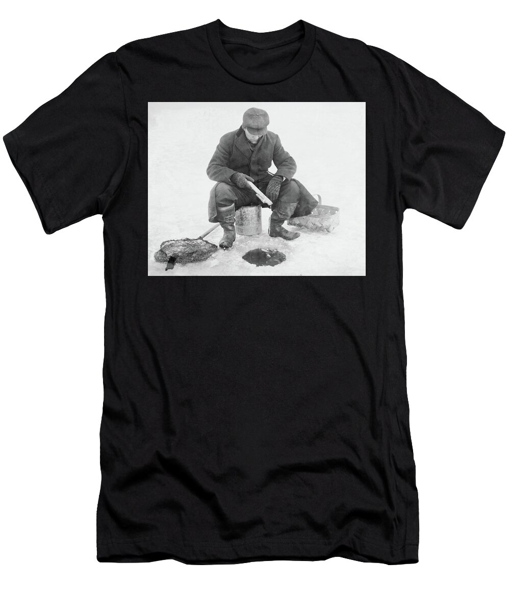 Man Ice Fishing T-Shirt featuring the photograph Fishing through Ice by Anthony Murphy