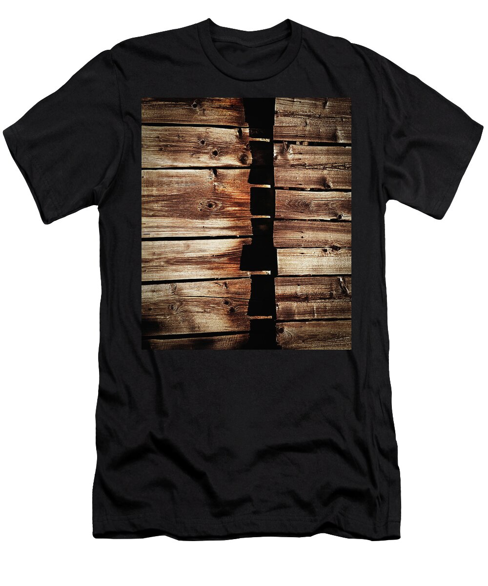 Dark T-Shirt featuring the photograph Horizontal boards on a wooden wall by Jozef Jankola