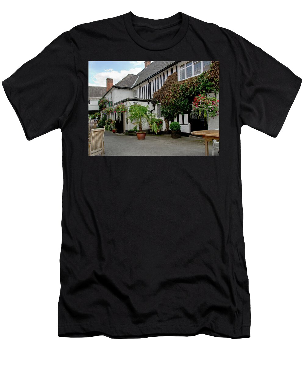 White House T-Shirt featuring the photograph Quiet street with flowers on walls. by Elena Perelman