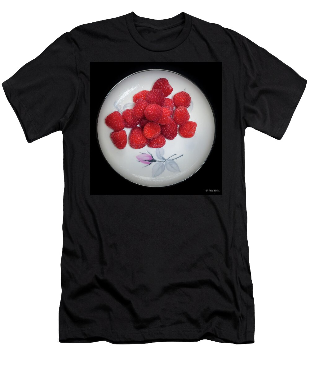 Berries T-Shirt featuring the photograph Raspberries on a plate with violet flower by Alexander Fedin