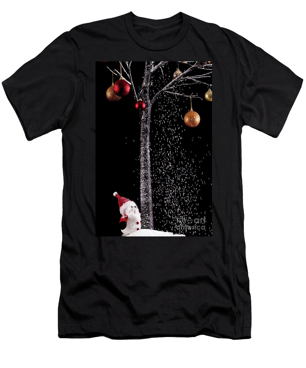 Xmas T-Shirt featuring the photograph Santa under a tree with snow on black background by Simon Bratt