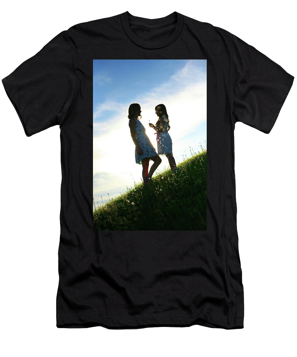 Child T-Shirt featuring the photograph The Gift by Charles Benavidez