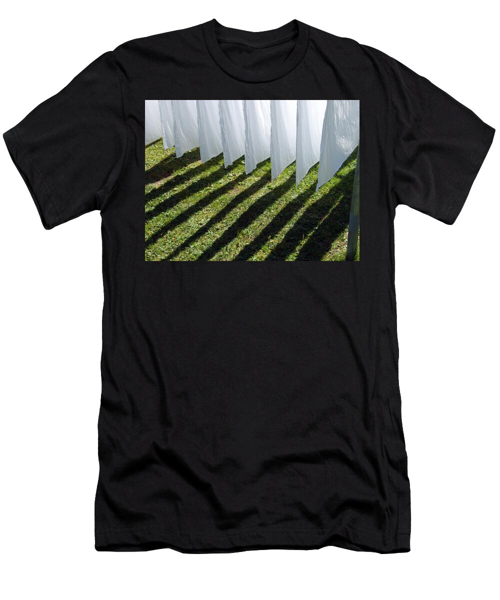 Shadow T-Shirt featuring the photograph The washing is on the line - shadow play by Matthias Hauser