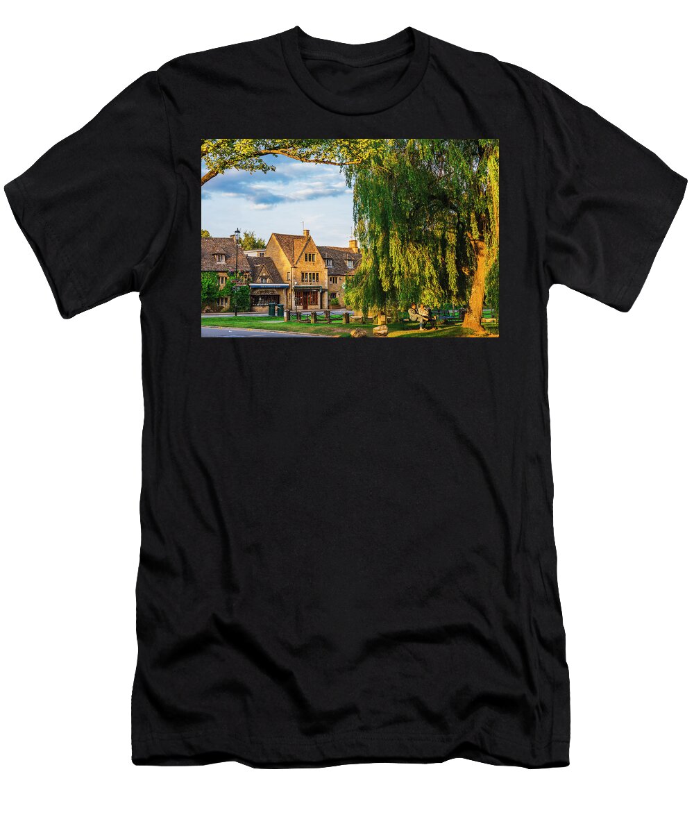 Estock T-Shirt featuring the digital art United Kingdom, England, Gloucestershire, Great Britain, Cotswolds, British Isles, Bourton-on-the-water, Tourists Walking By The Water Canals In Bourton-on-the-water At Sunset On A Sunny Summer Afternoon #2 by Maurizio Rellini