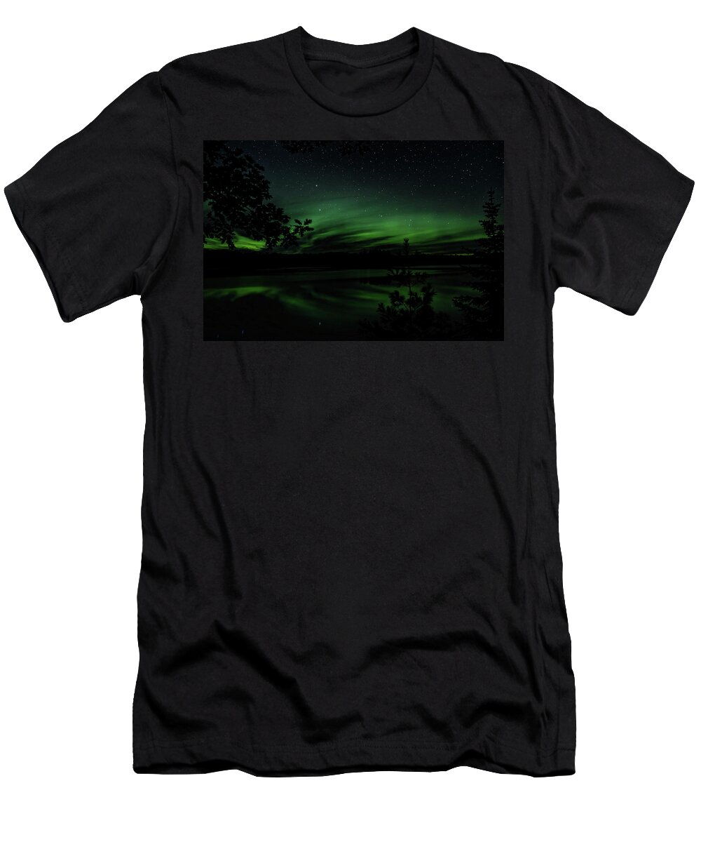 Aurora Borealis T-Shirt featuring the photograph Aurora Behind The Trees by Dale Kauzlaric