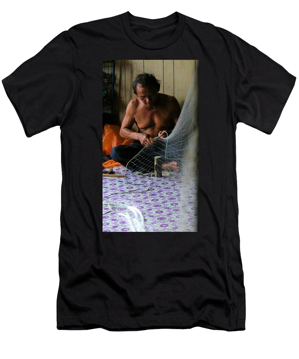Fisherman T-Shirt featuring the photograph Bruneian Fisherman repairs the net by Robert Bociaga
