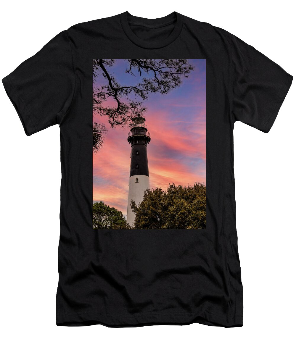 America T-Shirt featuring the photograph Hunting Island Lighthouse at sunset by Karen Foley