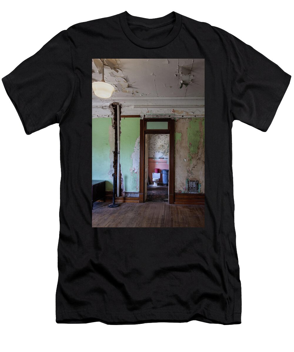 Mansfield Reformatory T-Shirt featuring the photograph White Toilet Thru Doorway by Lon Dittrick