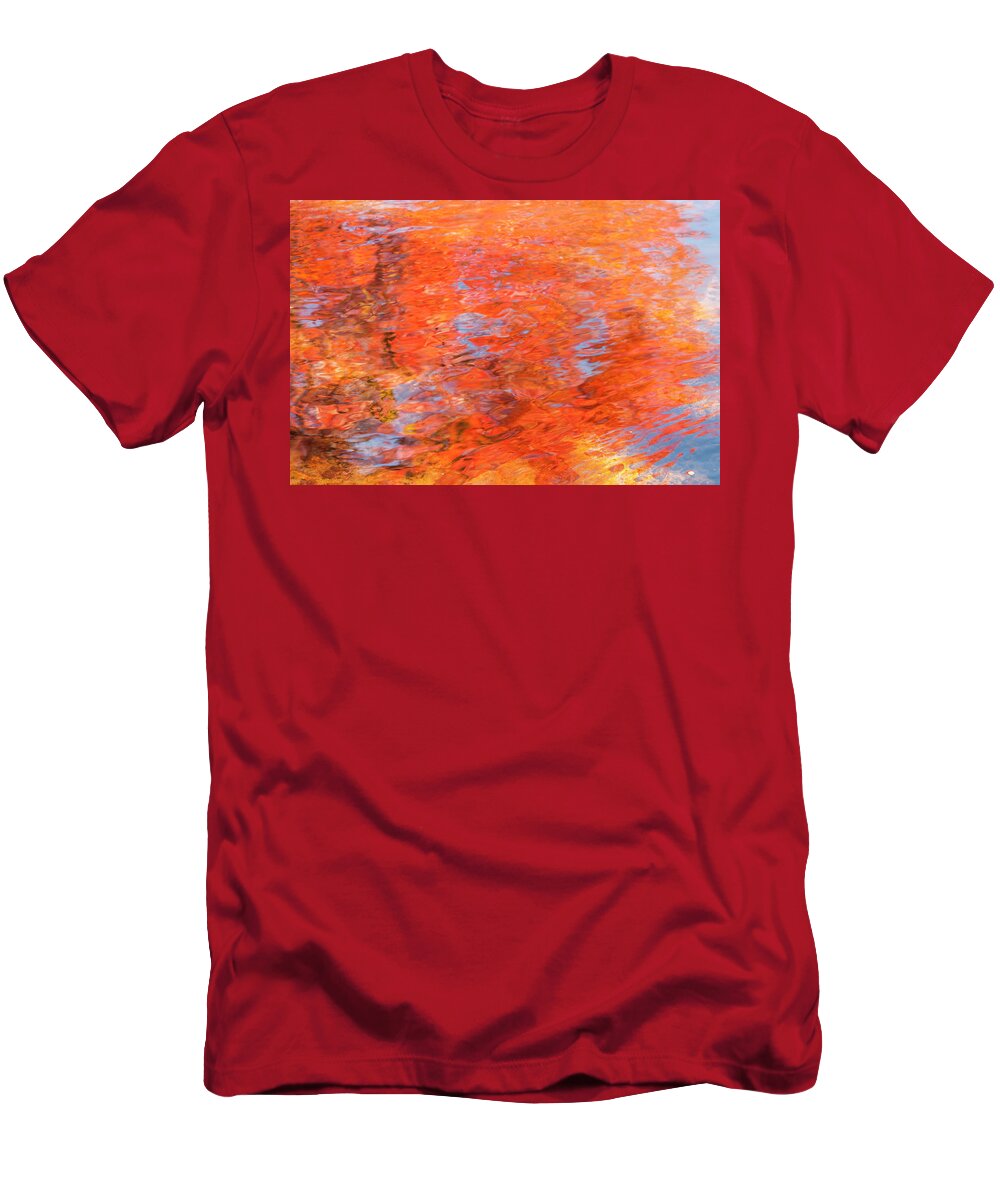 Autumn T-Shirt featuring the photograph Colors reflecting in a pond becomes a wash of color. by Usha Peddamatham
