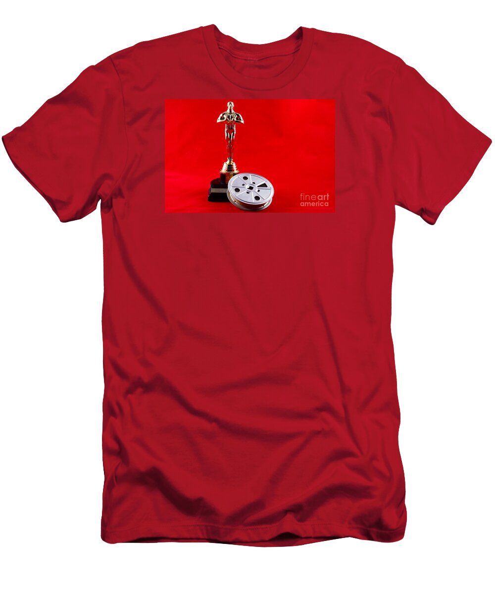 Academy T-Shirt featuring the photograph Oscar Statuette with Movie Reel by Karen Foley