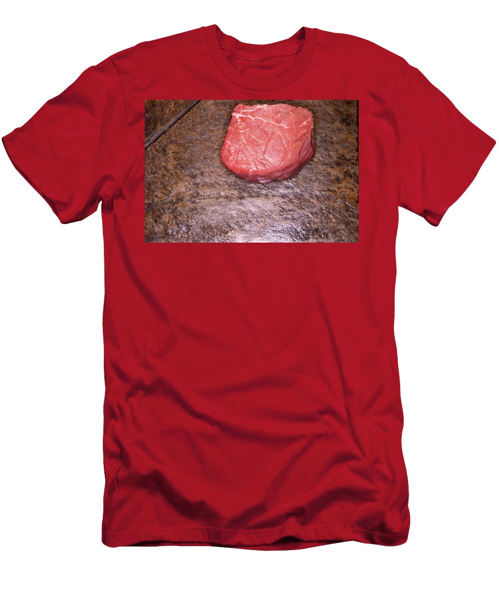 Beef T-Shirt featuring the photograph Raw filet mignon steak on slate by Karen Foley