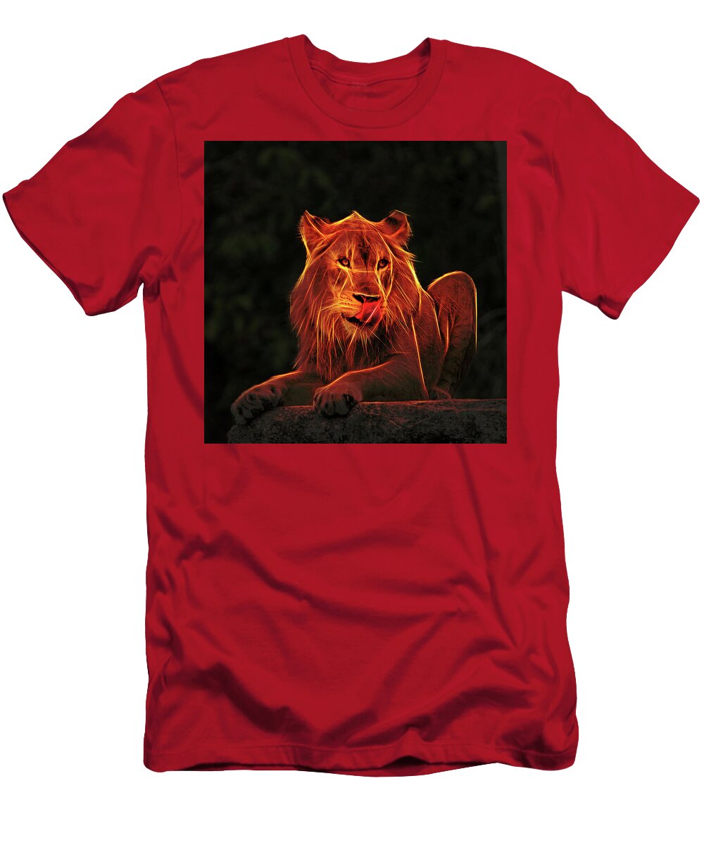 Mighty Lion Sitting High On A Ledge Licking His Chops As He Looks For His Next Meal. T-Shirt featuring the photograph The Mighty Lion by Elaine Walsh