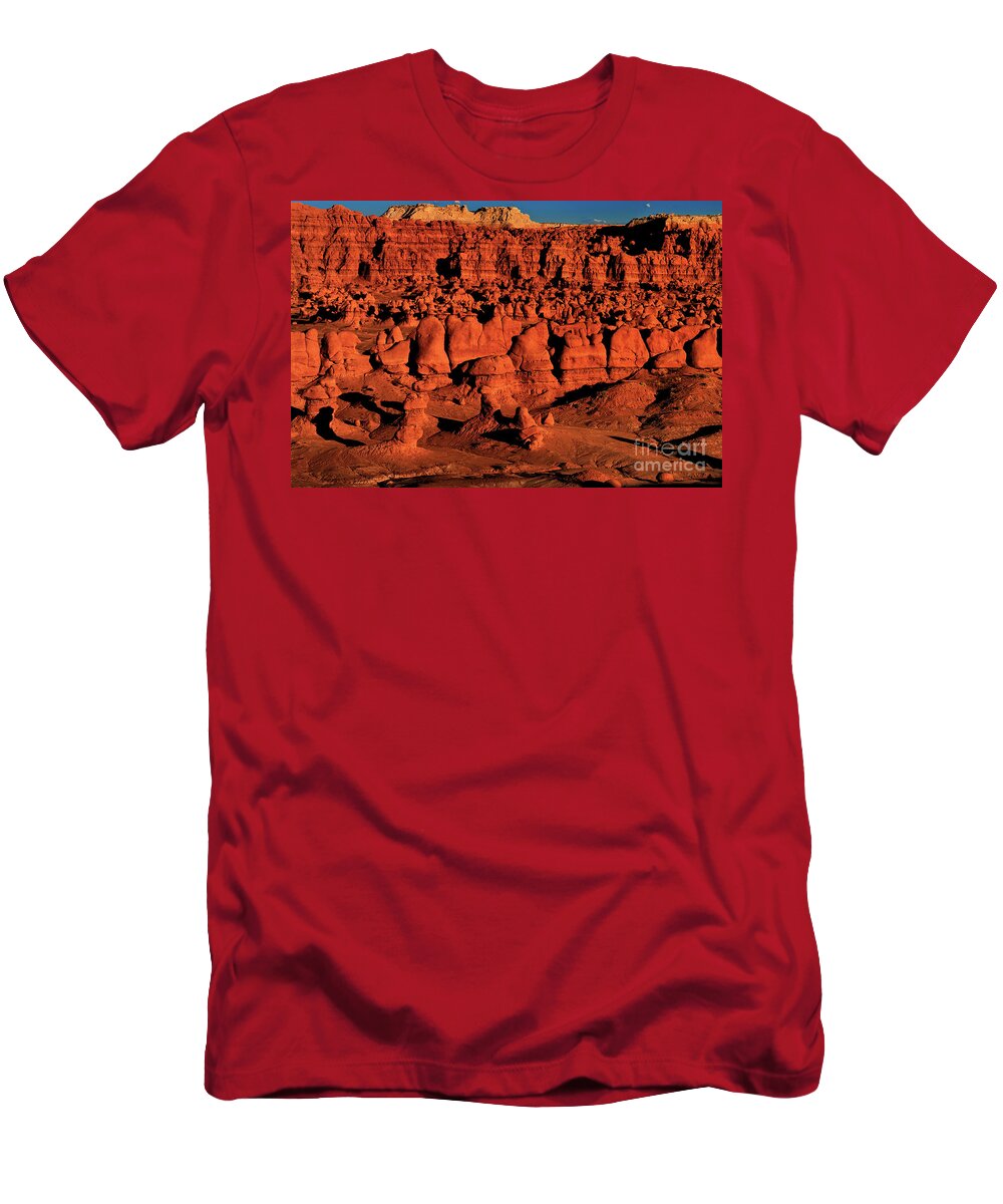 North America T-Shirt featuring the photograph Sunset Light Turns The Hoodoos Blood Red In Goblin Valley State Park Utah by Dave Welling