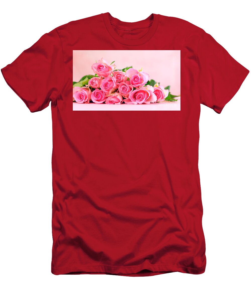 Mothers Day T-Shirt featuring the photograph Pink roses on pink wood table, Mother's Day background with copy space. by Milleflore Images