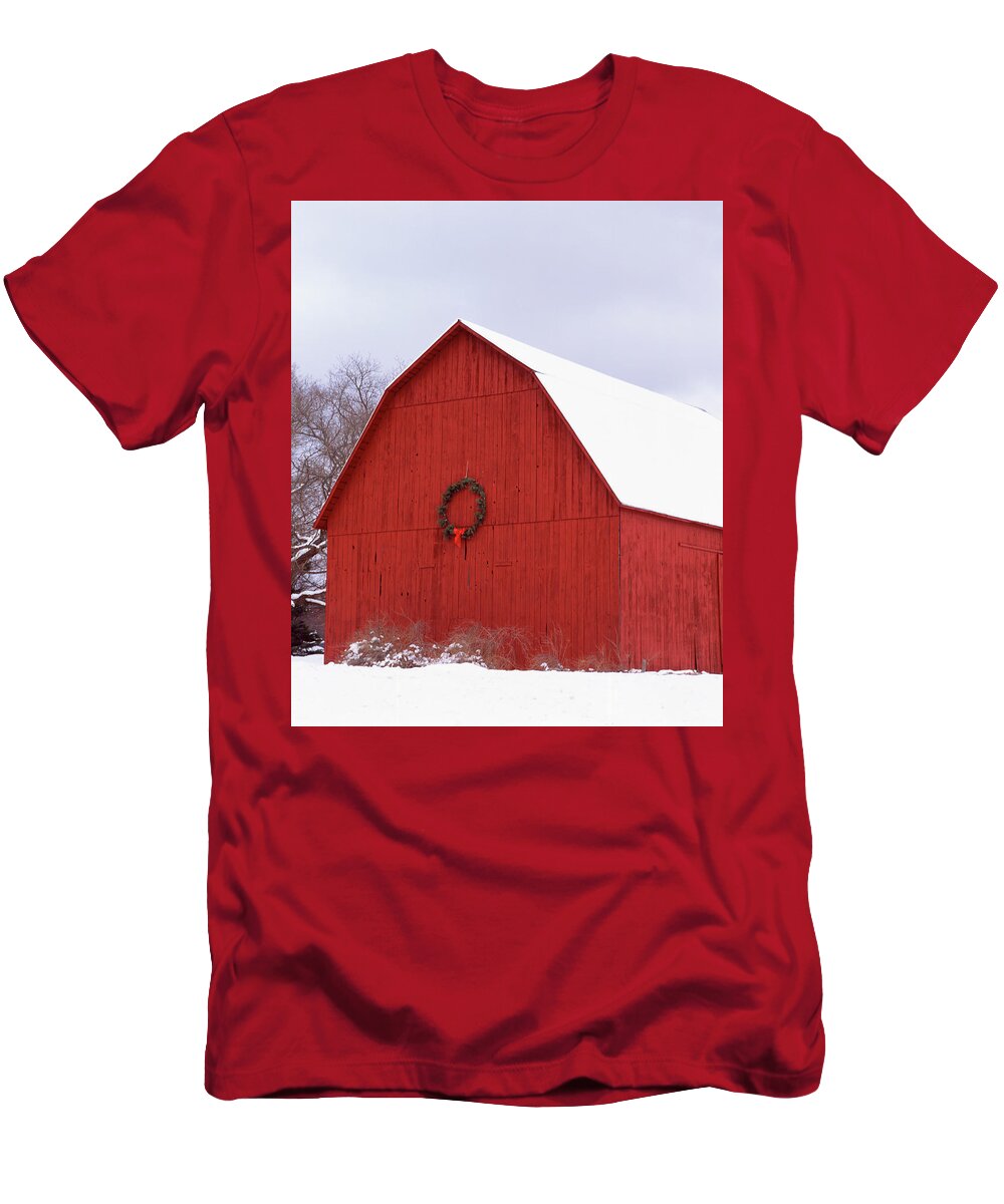 Agricultural Building Agriculture Architecture Bare Tree Barn Building Exterior Celebration Christmas Cold Farm Farmhouse Field Frozen Leelanau County Leland Michigan Red Rural Scene Traditional Culture Travel Destinations Usa Winter Wreath Cold Temperature Color Image Covering Day Gable Hanging No People Outdoors Photography Sky Snow Vertical Built Structure Building Structure T-Shirt featuring the photograph Wreath hanging on a barn, Leland, Leelanau County, Michigan, USA by Panoramic Images