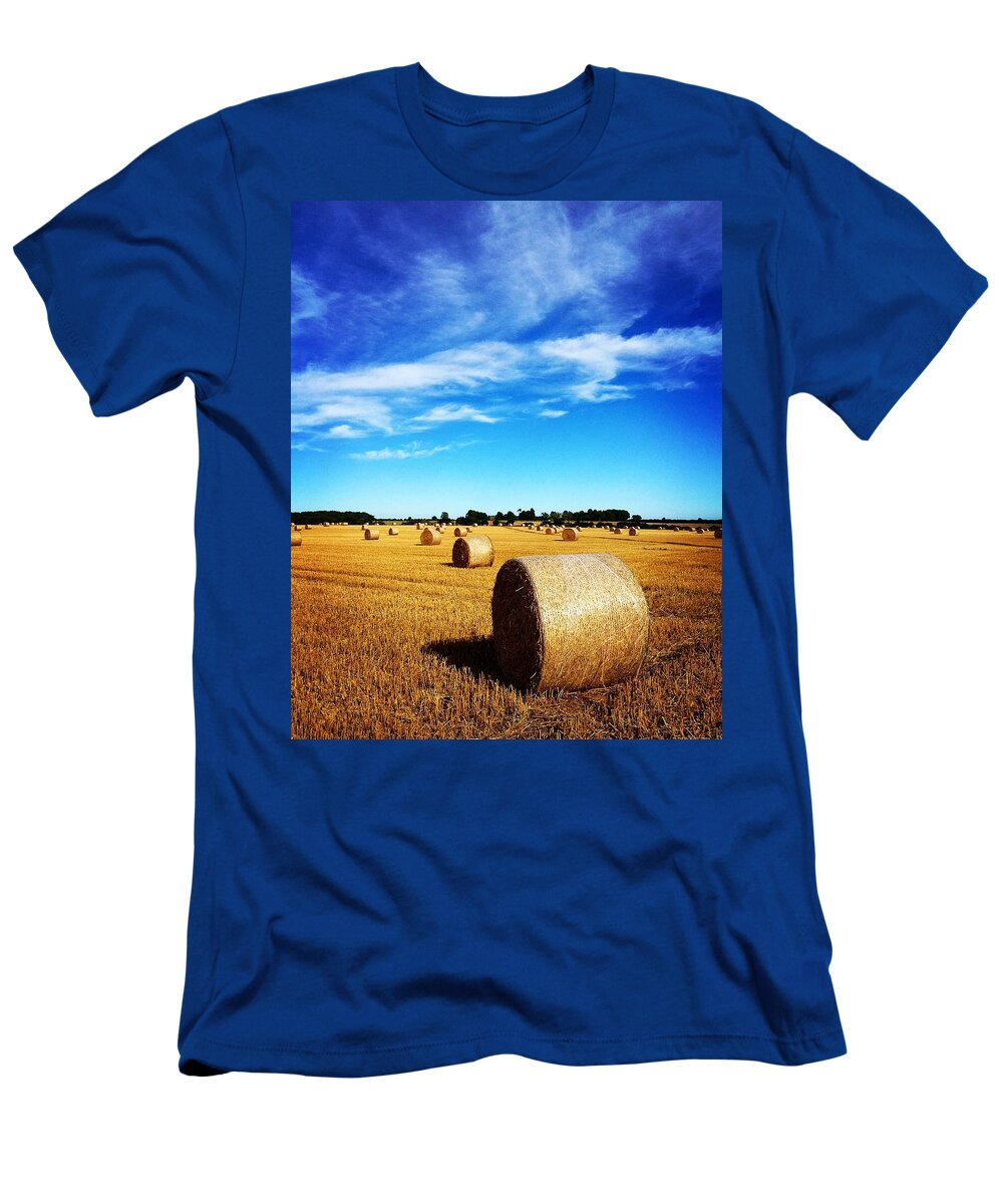 Britain T-Shirt featuring the photograph Straw bales at harvest time by Seeables Visual Arts