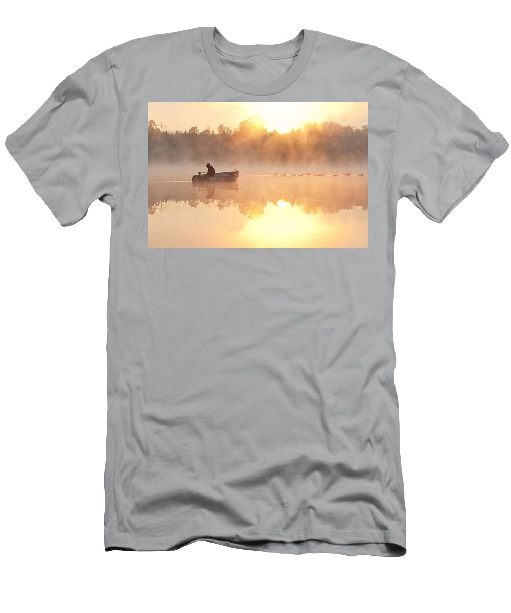 Landscape T-Shirt featuring the photograph Sunrise in fog Lake Cassidy with fisherman in small fishing boat #1 by Jim Corwin