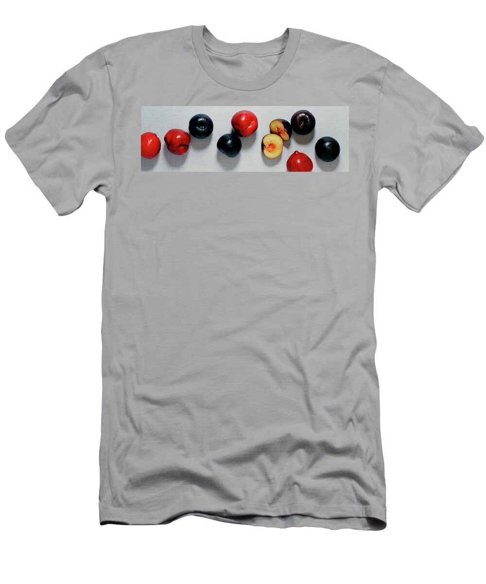 Fruits T-Shirt featuring the photograph A Bunch Of Plums by Romulo Yanes