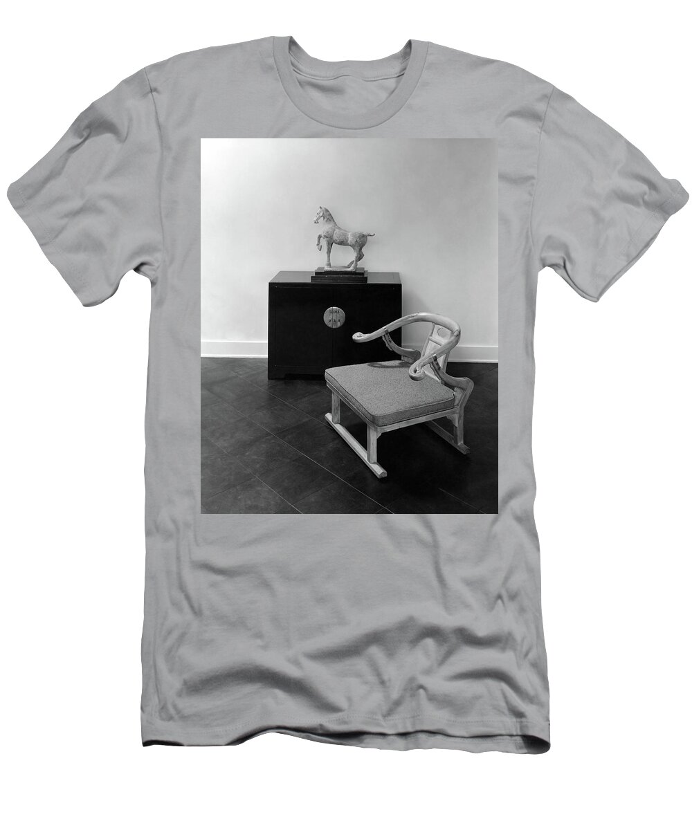Home T-Shirt featuring the photograph A Chair, Bedside Cabinet And Sculpture Of A Horse by Haanel Cassidy