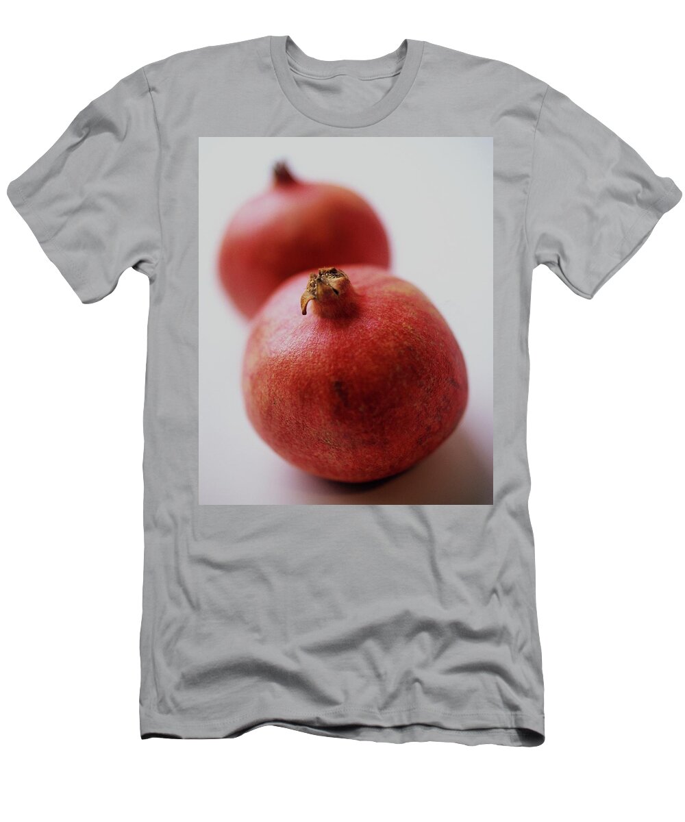 Fruits T-Shirt featuring the photograph Two Pomegranates by Romulo Yanes
