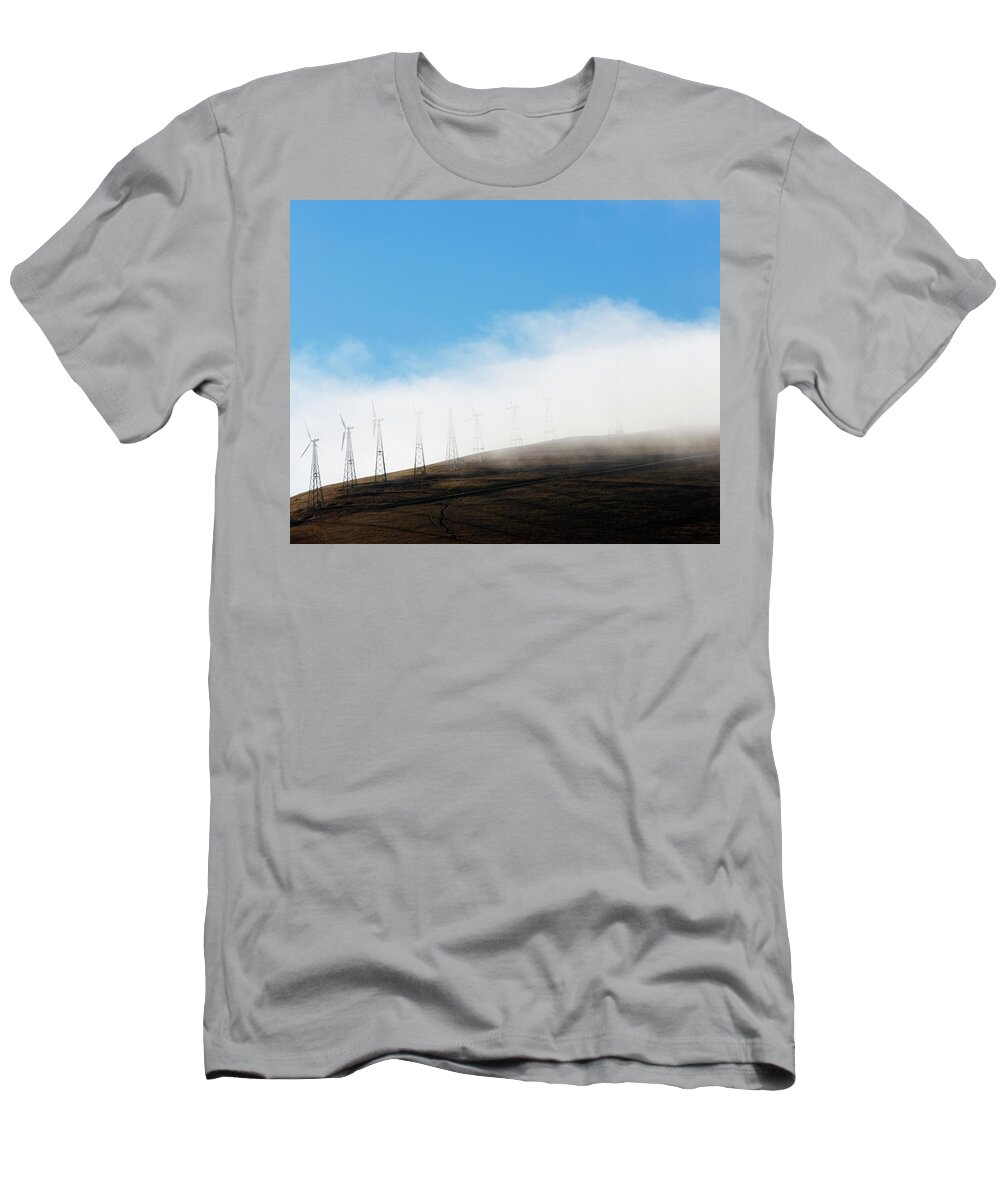 Aerial T-Shirt featuring the photograph Wind Turbines On A Hill With The Fog by Ron Koeberer