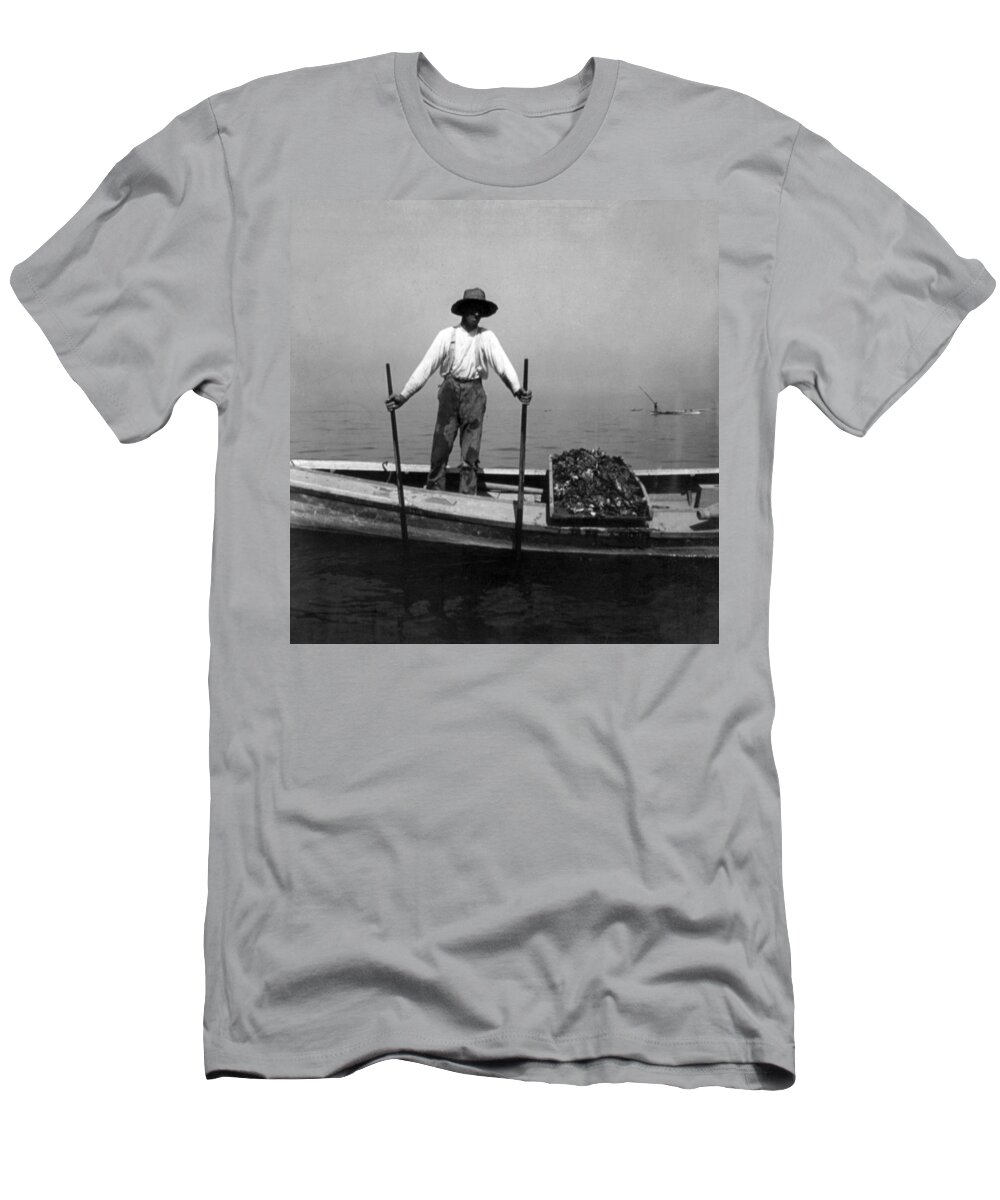 chesapeake Bay T-Shirt featuring the photograph Oyster Fishing on the Chesapeake Bay - Maryland - c 1905 by International Images