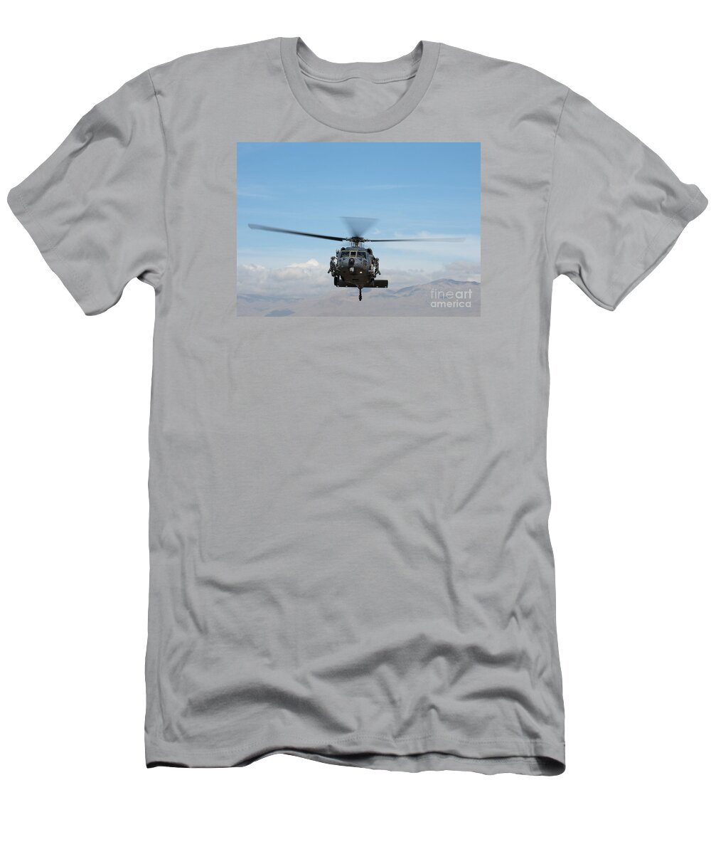 An Hh-60g Pave Hawk T-Shirt featuring the painting An HH-60G Pave Hawk by Celestial Images