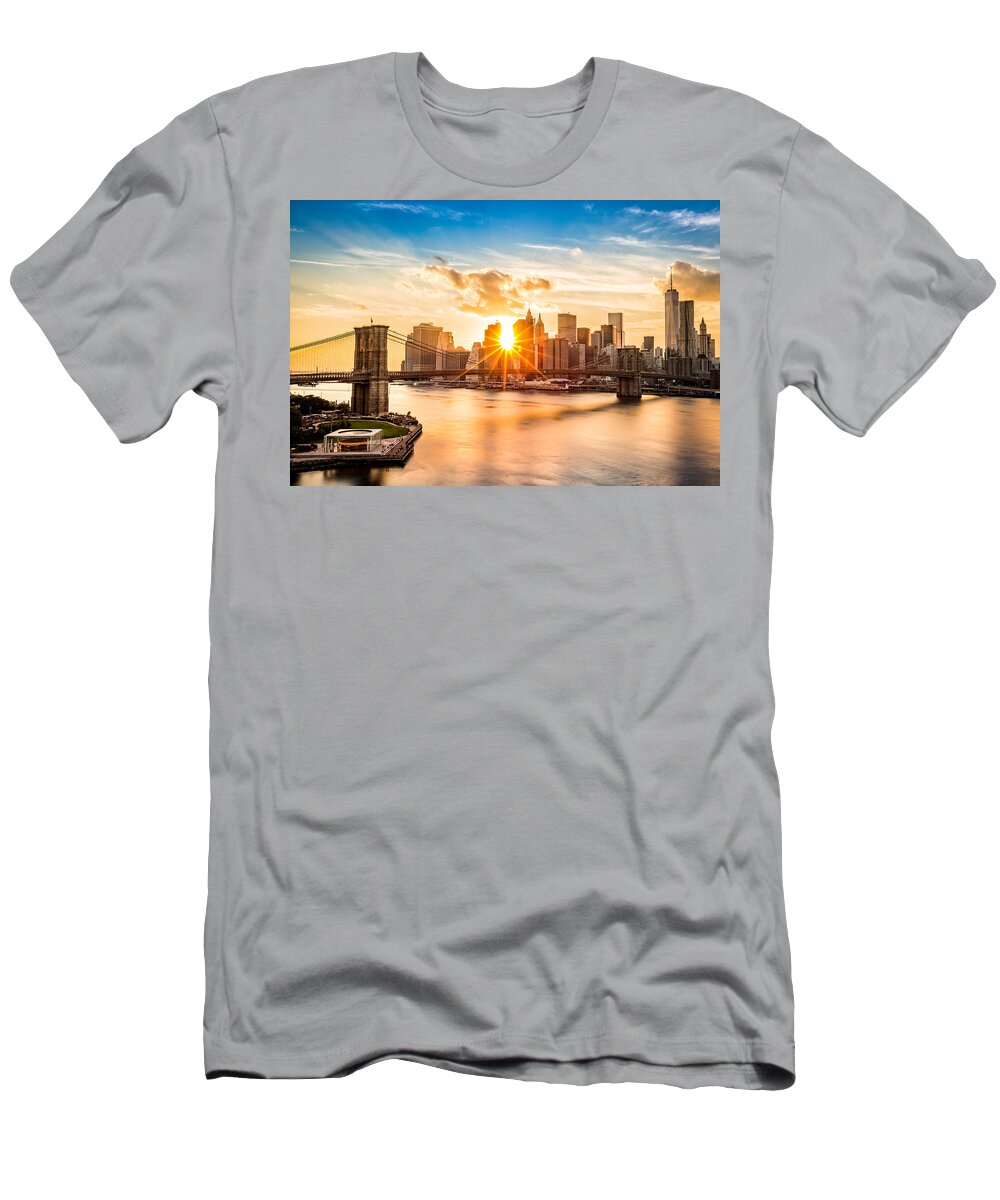 America T-Shirt featuring the photograph Brooklyn Bridge and the Lower Manhattan skyline at sunset by Mihai Andritoiu