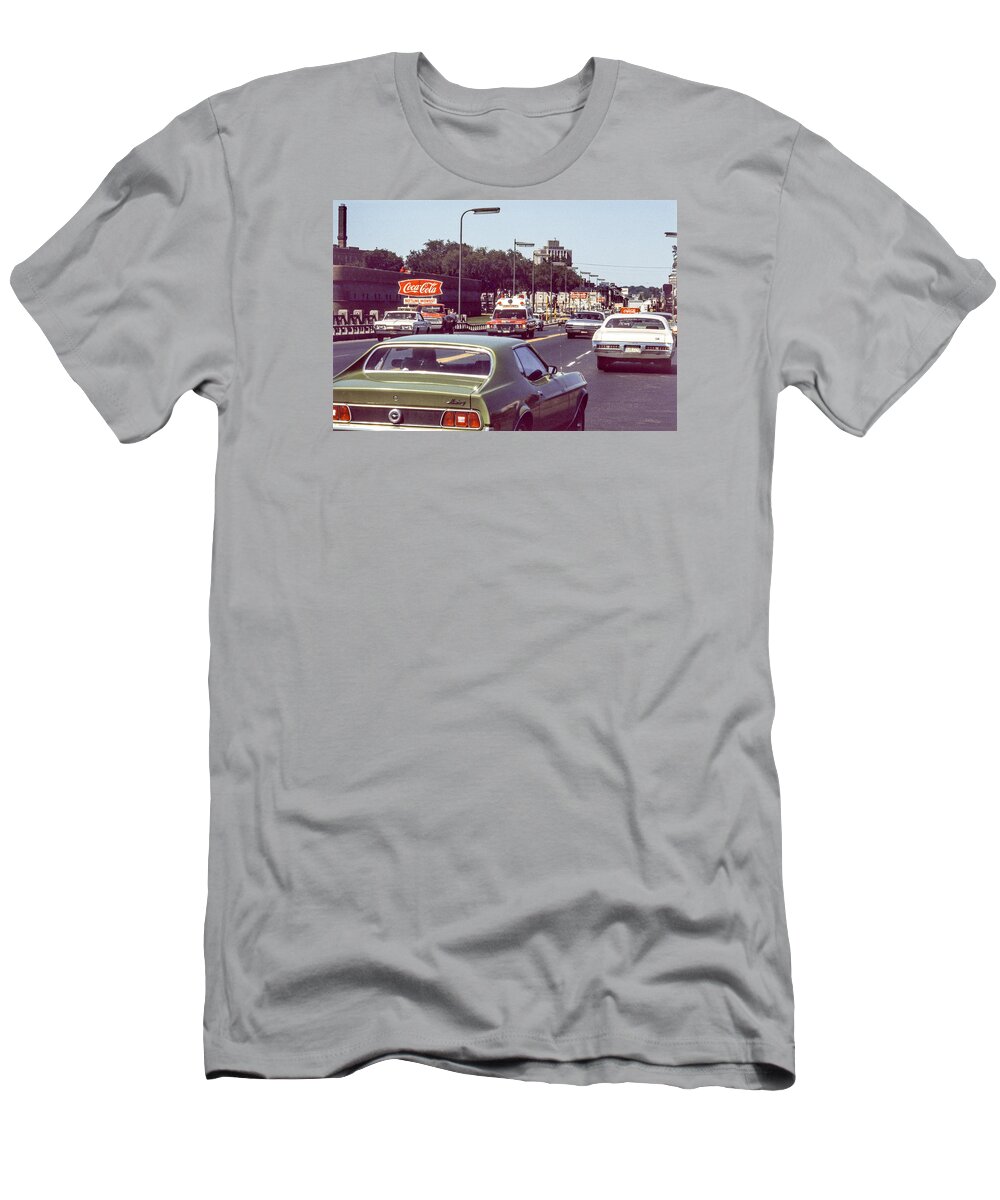 Actions T-Shirt featuring the photograph Coca Cola plant on Central Ave by Mike Evangelist