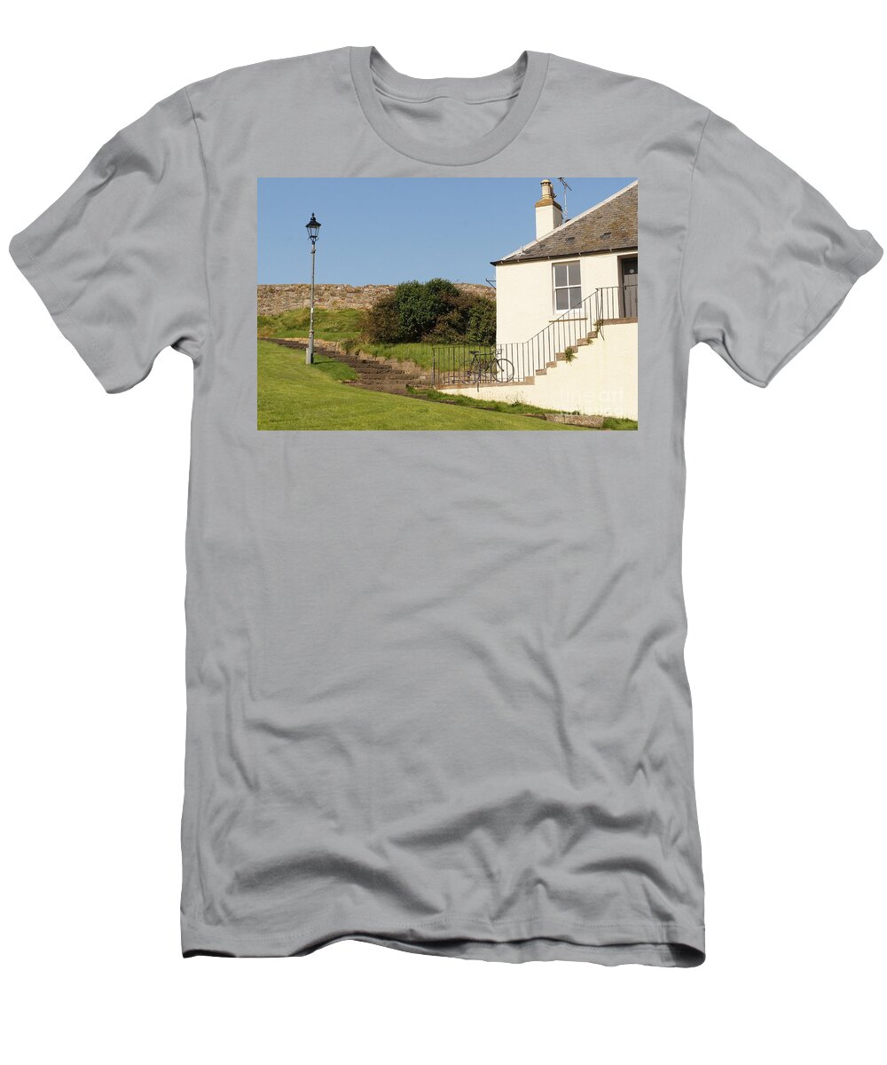 House On The Slope T-Shirt featuring the photograph House on the slope with a bike and a lamppost. by Elena Perelman