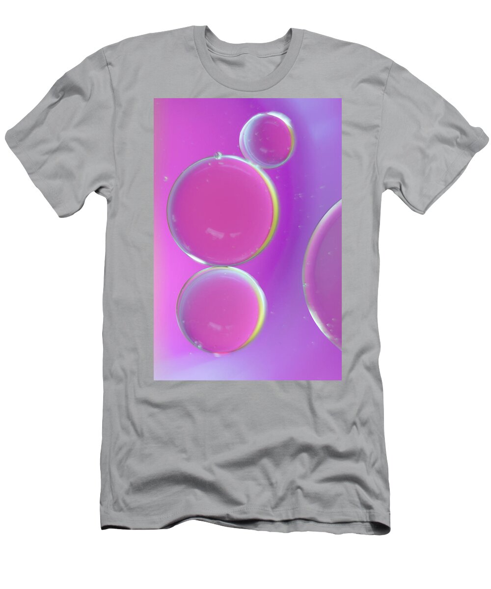 Water T-Shirt featuring the photograph Oil on water abstract by Andy Myatt