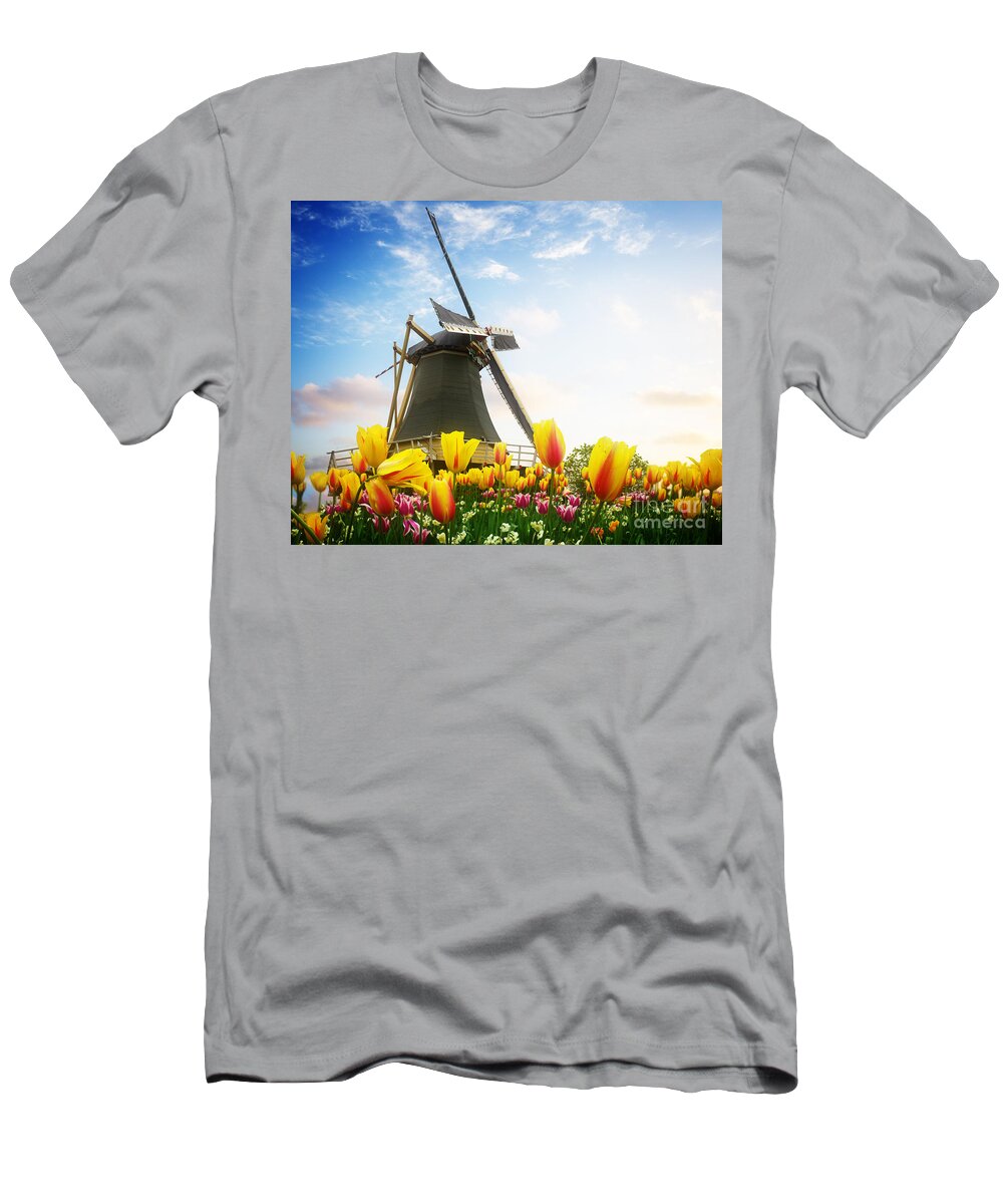 Netherlands T-Shirt featuring the photograph One Dutch Windmill Over Tulips by Anastasy Yarmolovich
