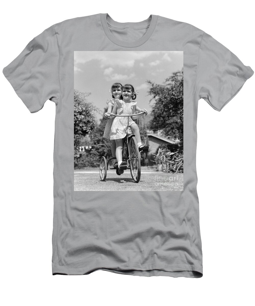 1940s T-Shirt featuring the photograph Twin Girls On A Tricycle, C.1940s by H. Armstrong Roberts/ClassicStock