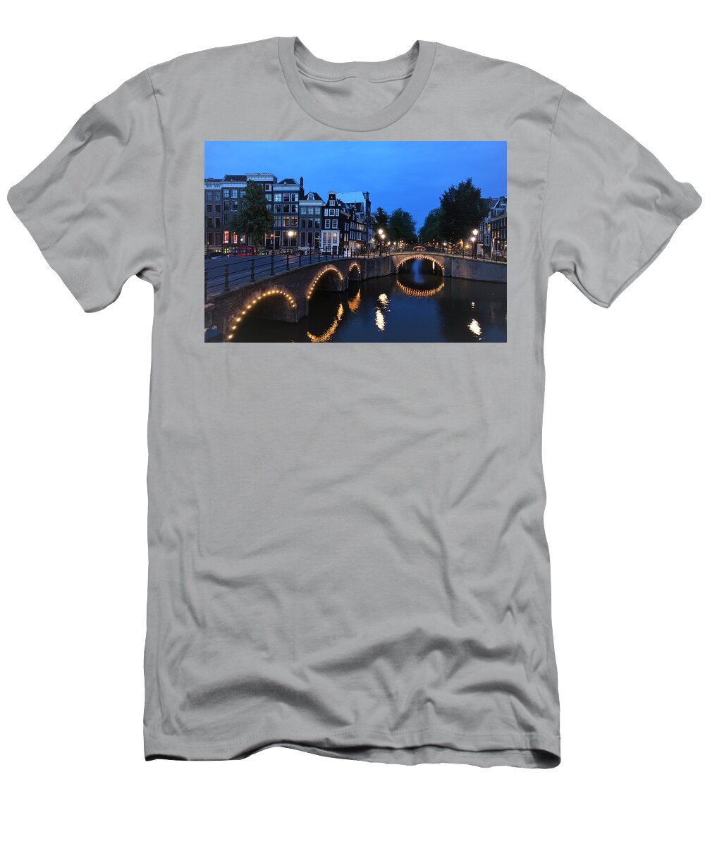 Night T-Shirt featuring the photograph Amsterdam Canals lit up at night by Patricia Caron