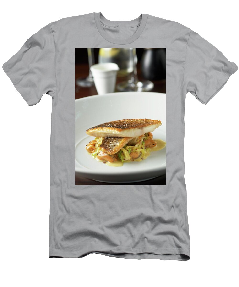 Ip_11215748 T-Shirt featuring the photograph Fried Sea Bass Fillets On Ribbon Pasta With Mussels by Tim Green