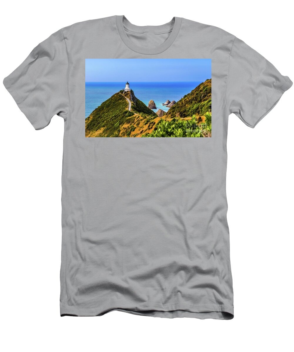 Lighthouse T-Shirt featuring the photograph Nugget Point lighthouse, New Zealand by Lyl Dil Creations