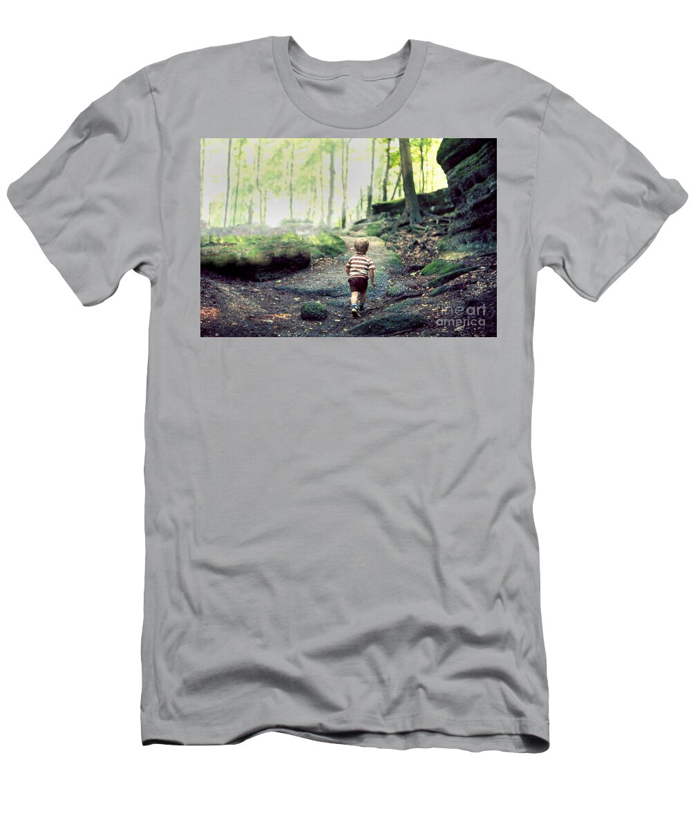 Hiking T-Shirt featuring the photograph Three year old small boy child hiking alone on an uphill trail in a boulder strewn deciduous forest by Robert C Paulson Jr