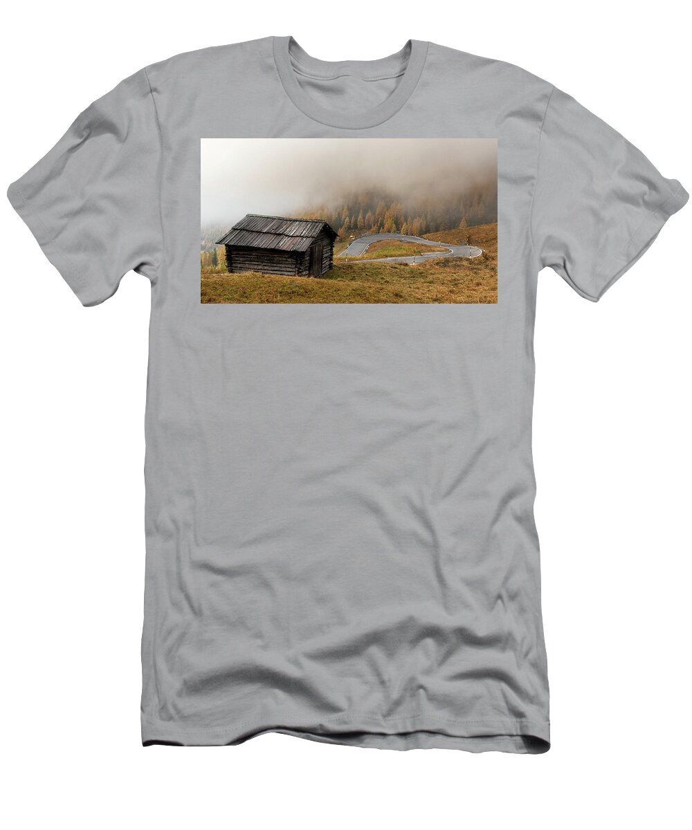 Passo Gardena T-Shirt featuring the photograph Autumn landscape with wooden chalet dolomiti Italian Apls by Michalakis Ppalis