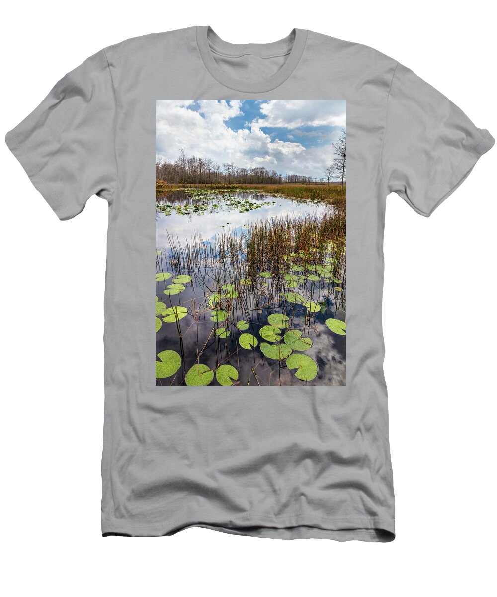 Clouds T-Shirt featuring the photograph Lily Pads Floating on the Glades by Debra and Dave Vanderlaan