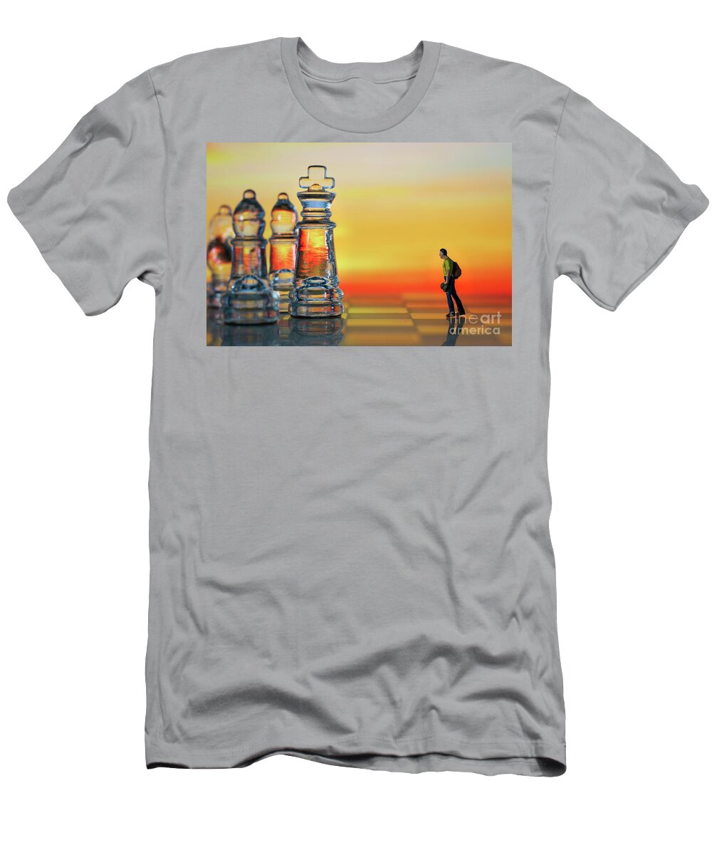 Rule T-Shirt featuring the photograph Miniature figure people as businessman standing face to face with King chess piece on chessboard. Sunset background. Macro by Pablo Avanzini