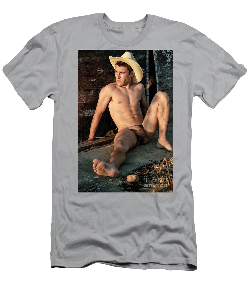 Male Art T-Shirt featuring the photograph Naked cowboy rest in the setting sun. by Gunther Allen
