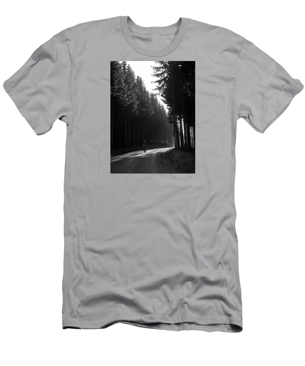 Battle Of The Bulge T-Shirt featuring the photograph Soldier Walking Through The Forest - Battle Of The Bulge - 1944 by War Is Hell Store