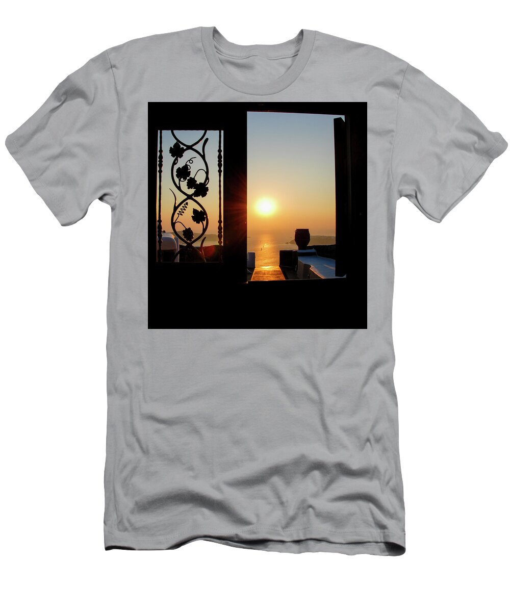 Nightfall T-Shirt featuring the photograph Sunset in the aegean sea from a house. Santorini island Greece. by Michalakis Ppalis