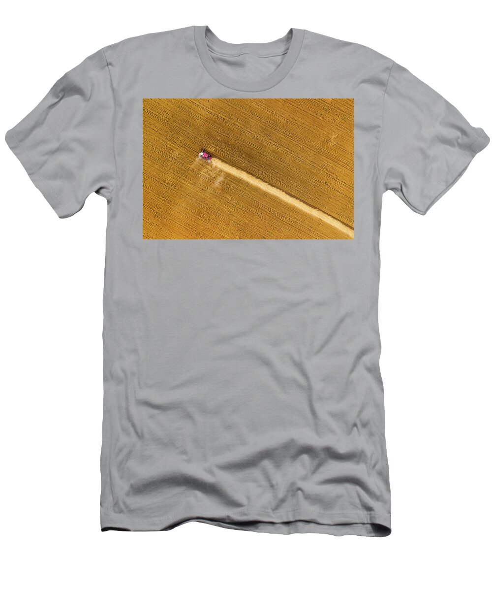Agriculture T-Shirt featuring the photograph Top view of combine on harvest field by Mikhail Kokhanchikov