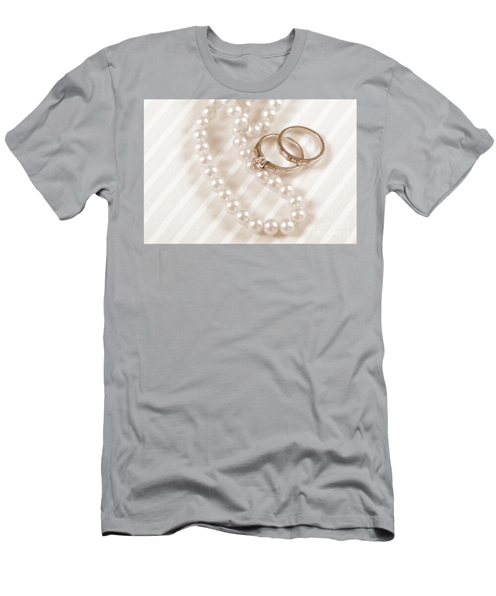 Card T-Shirt featuring the photograph Wedding and diamond engagement rings with pearl necklace by Milleflore Images