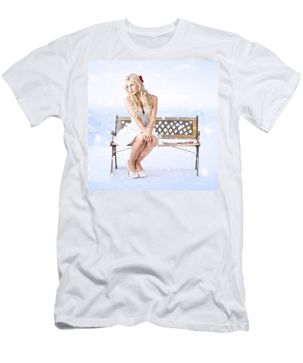 Winter T-Shirt featuring the photograph Cold and lonely winter woman sitting all alone #1 by Jorgo Photography