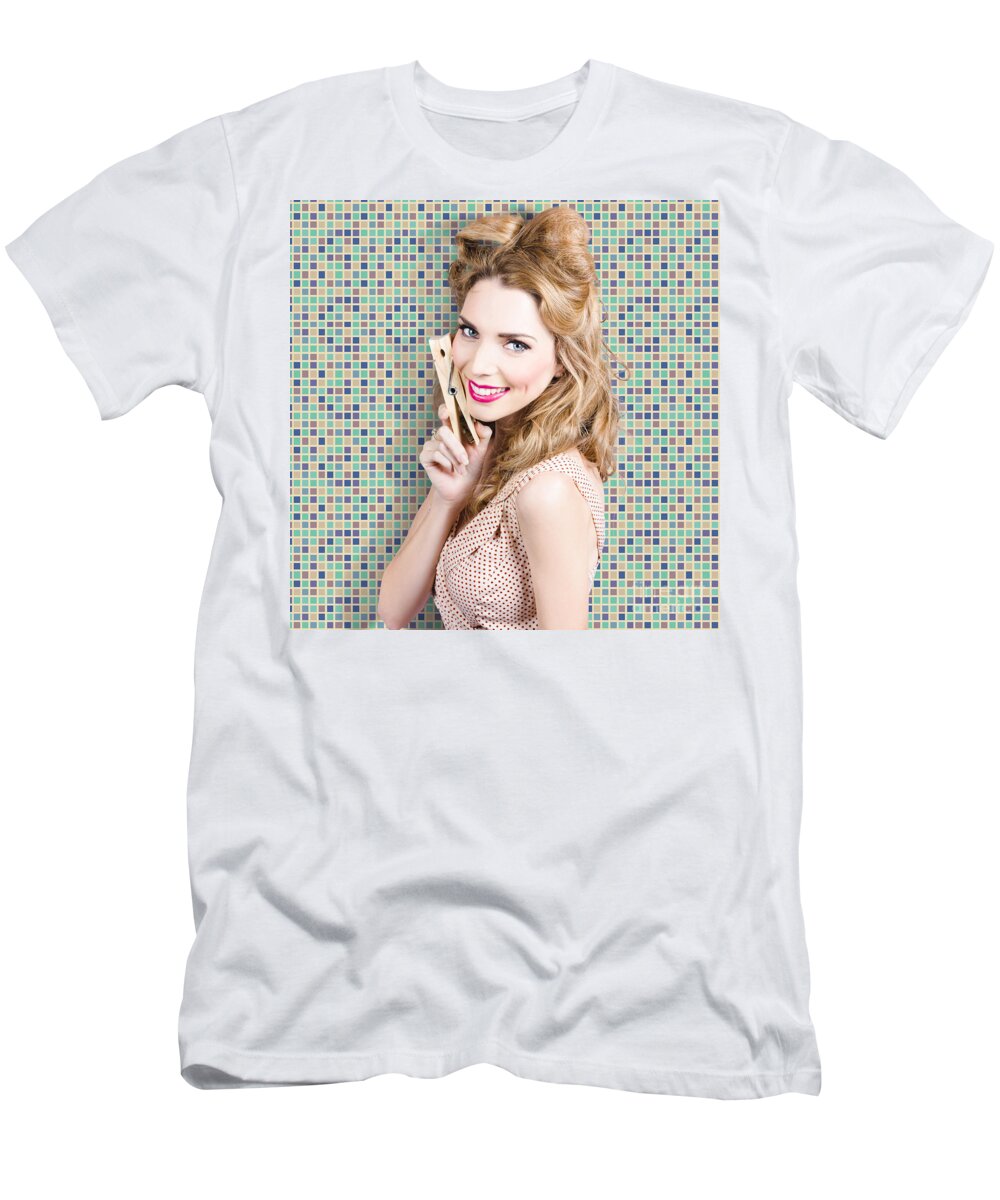 Laundry T-Shirt featuring the photograph Housework. Smiling young woman holding laundry peg #1 by Jorgo Photography